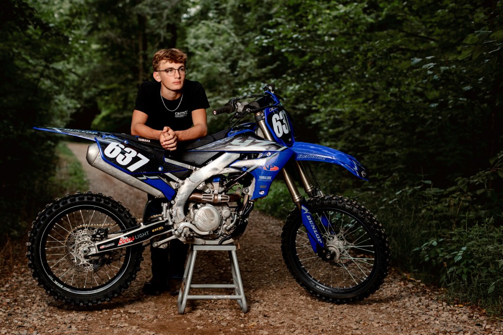 Senior photos featuring a dirt bike during a Southwest Michigan senior session