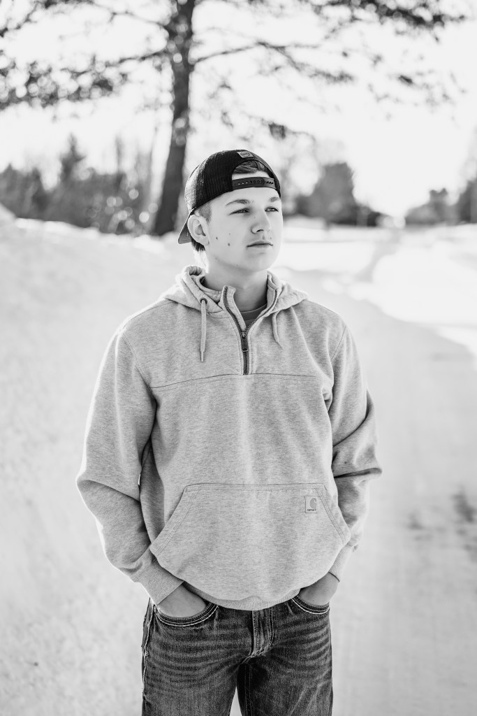black and white photo of senior male in winter photography shoot