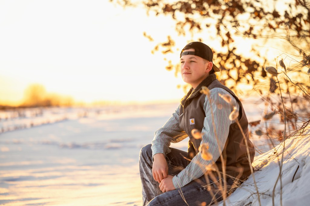 Winter senior photos in Michigan with snow and natural light