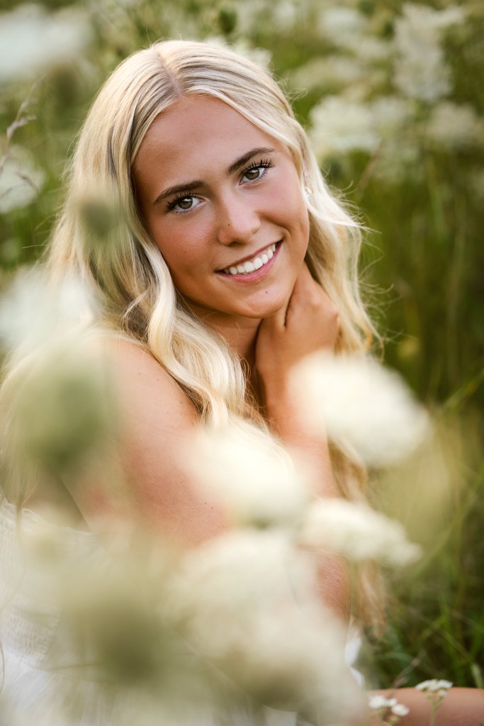 Senior portrait session in Southwest Michigan featuring confident high school senior in natural light