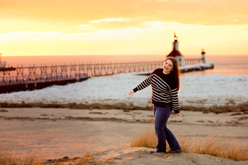 Natural candid senior portrait St Joseph Michigan beach