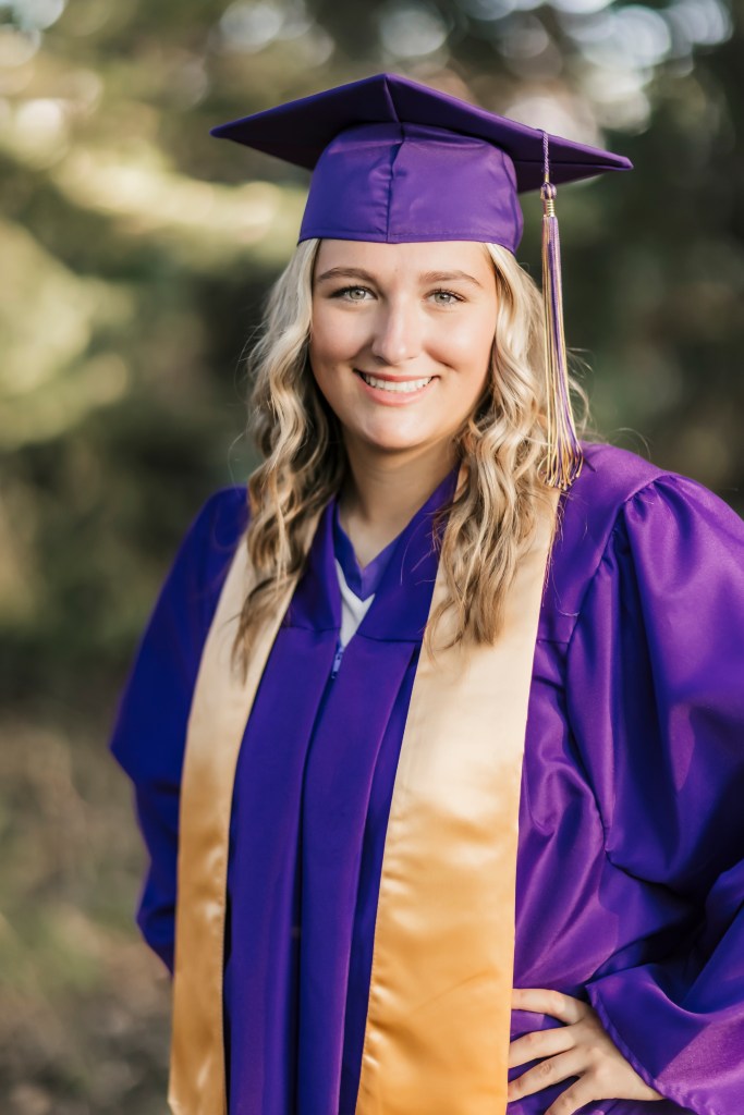 Schoolcraft Michigan senior picture of girl in cap and gown