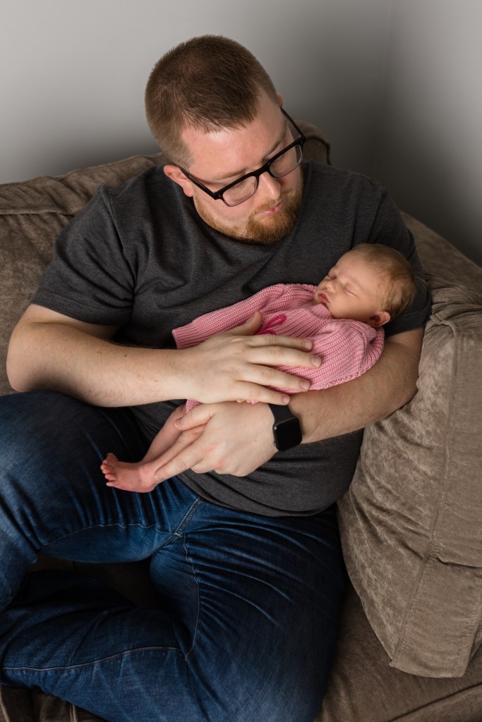 proud dad new daughter newborn photographer van buren county berrien county michigan