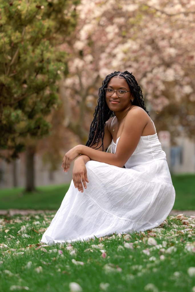Senior photography session under flowering trees