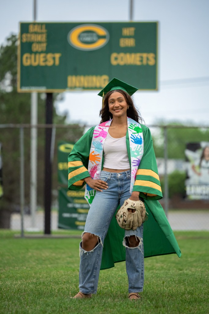 Southwest Michigan senior photography featuring Coloma Varsity Softball athlete in cap and gown