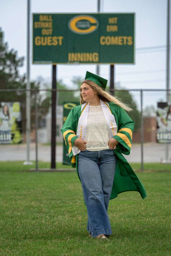 Class of 2026 Coloma softball senior portrait on the softball diamond in Southwest Michigan