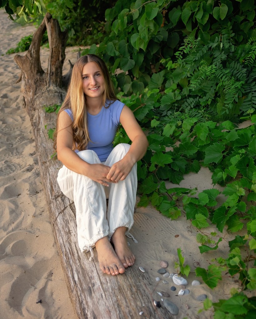 High school senior portrait at Rocky Gap County Park overlooking Lake Michigan.