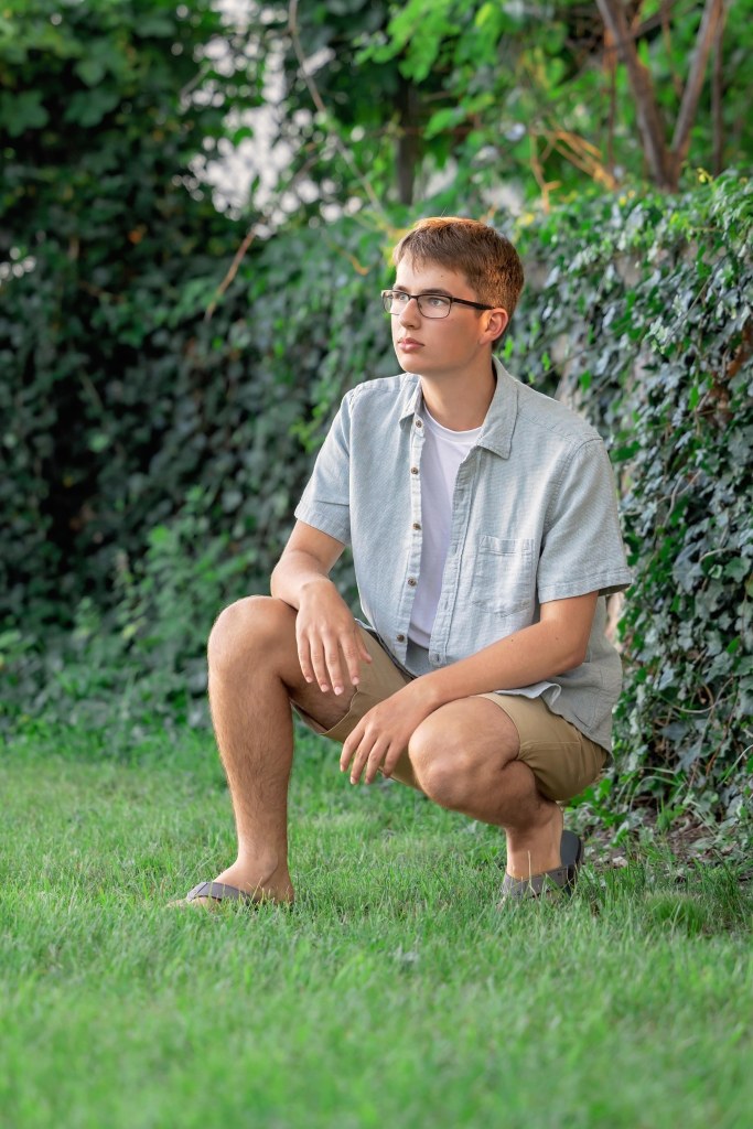 Senior portrait of a St. Joseph High School Class of 2027 student overlooking Lake Michigan in Berrien County
Twin brother