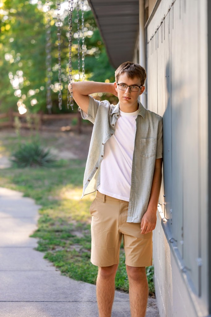 Senior boy portrait on the Lake Michigan shoreline in St. Joseph, Michigan