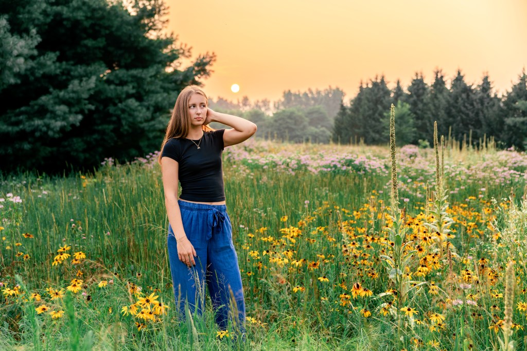 wild fire sunset over flower field high school senior session photographr